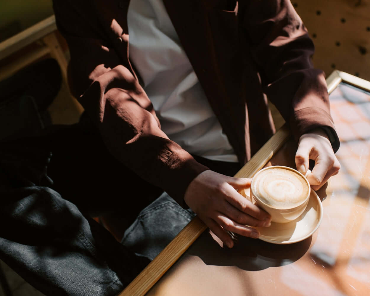 Take Your Dessert Game Up a Notch Nailing the Coffee and Cookie Combo with a stylish coffee cup in hand.