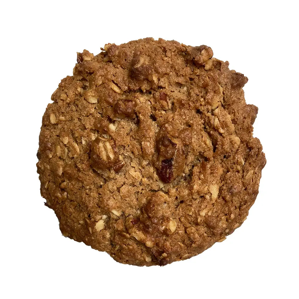 Delicious Cowboy Cookie filled with oatmeal, coconut, pecans, and chocolate chips, perfect for cookie cravings.